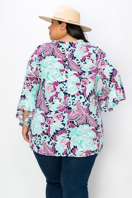 Plus size v-neck top with asymmetrical sleeves